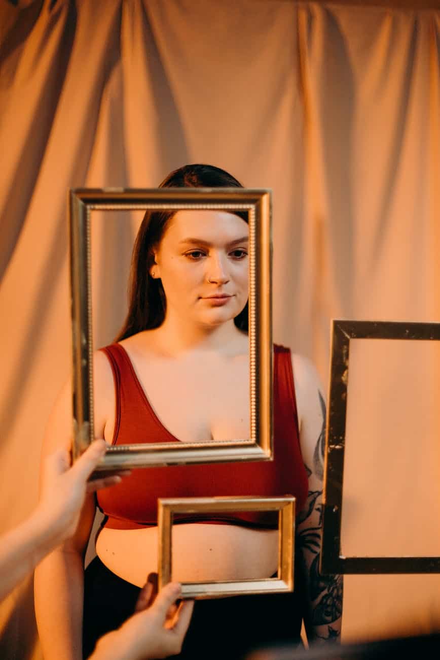photo of a person holding picture frame