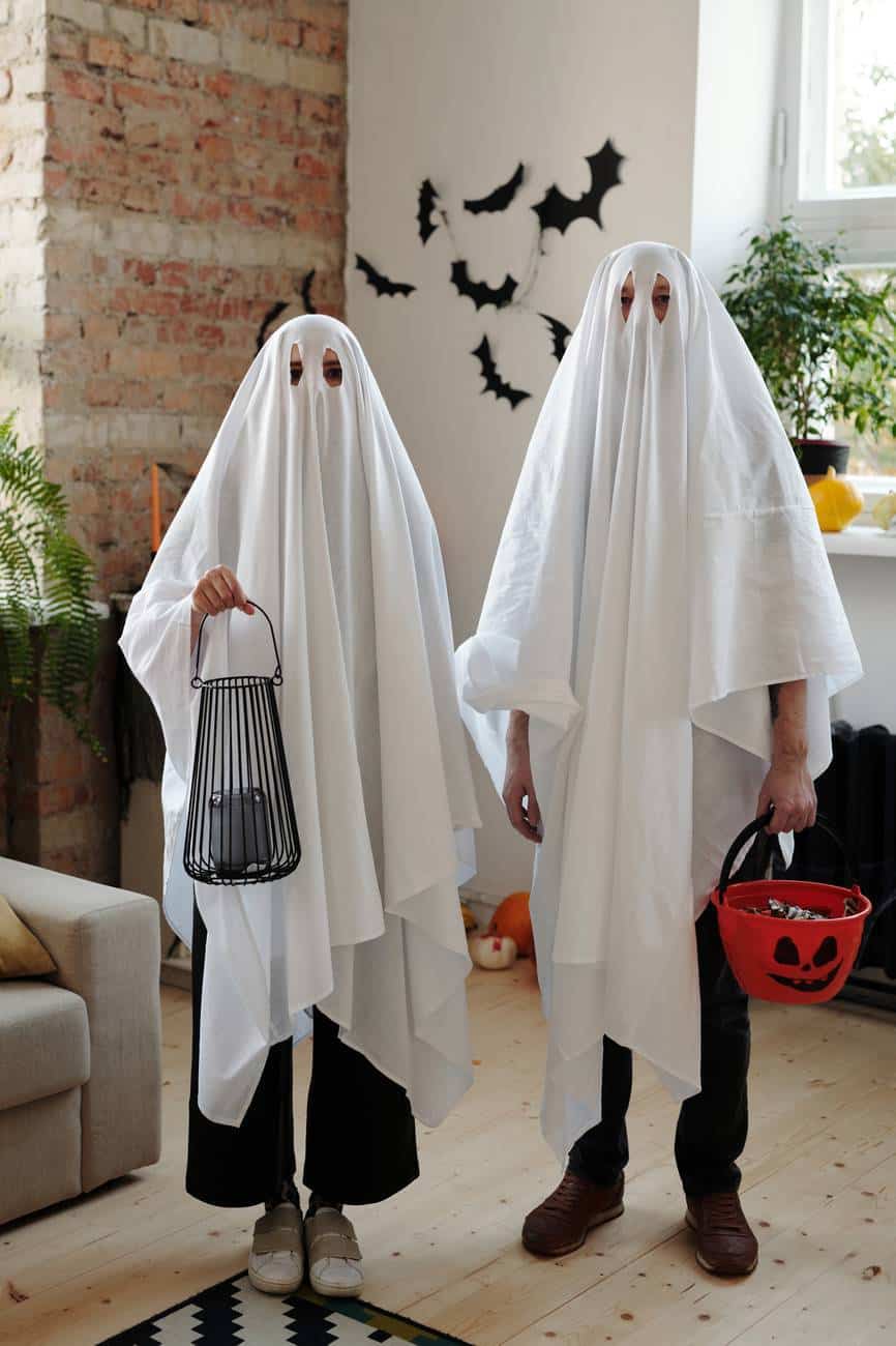 people in ghost costumes